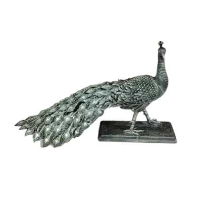 Intricately Carved Metal Peacock Statue