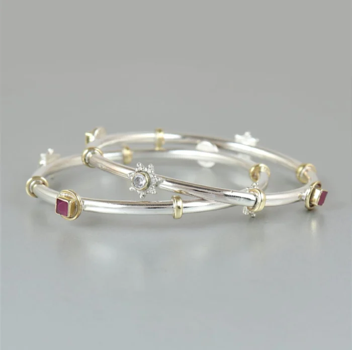 Contemporary Two-Tone Silver Bangle with Gold Accents & Gemstones - Image 1